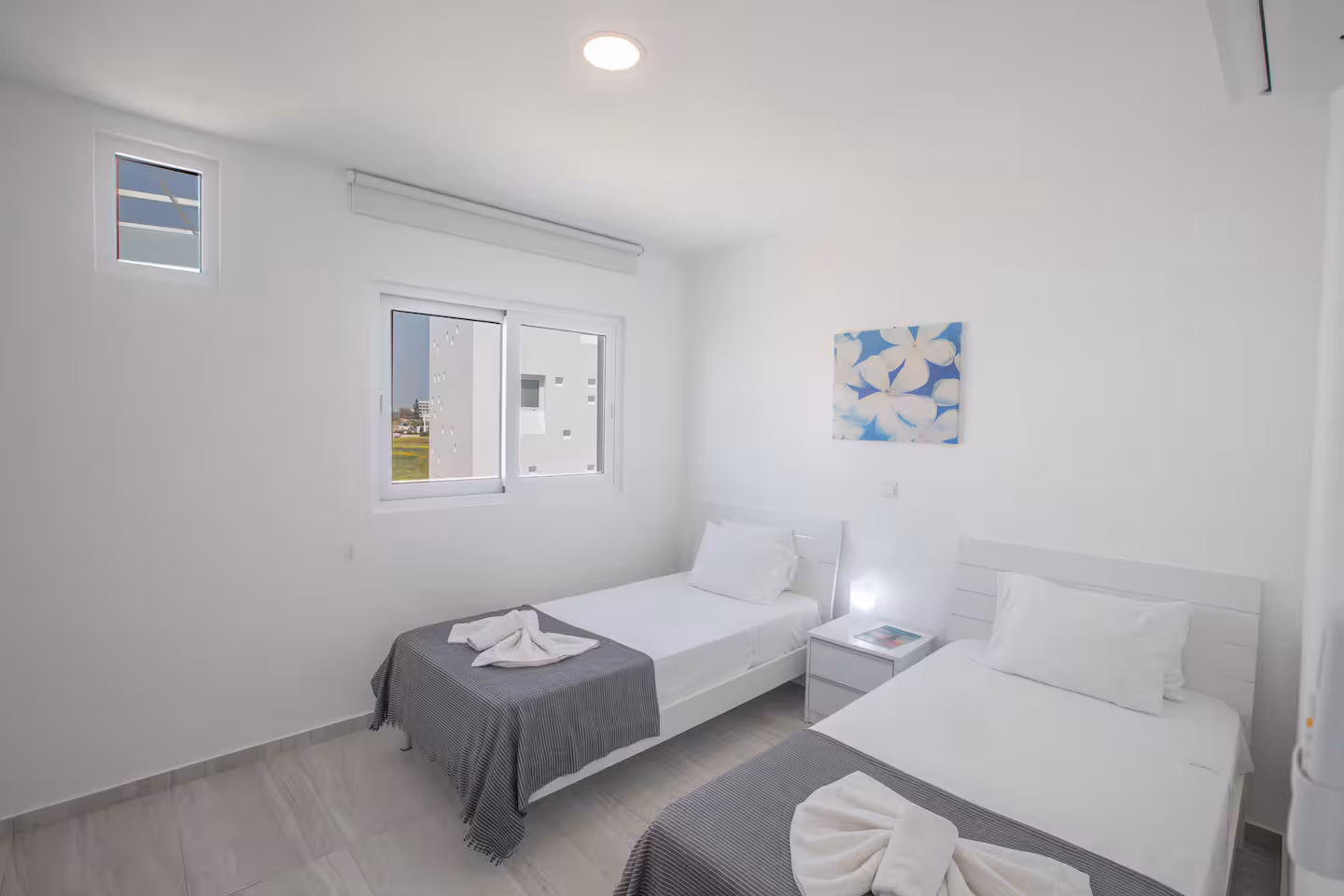 Twin bedroom prepared for guests