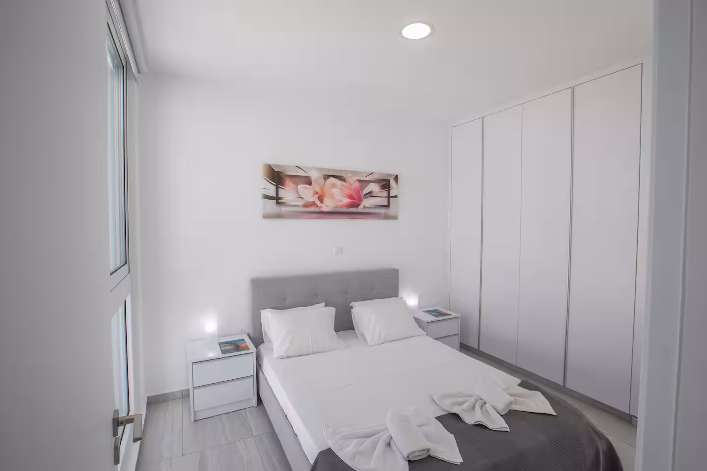 Bright double bedroom with fitted wardrobes